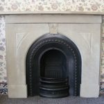 Victorian arched cast iron fireplace