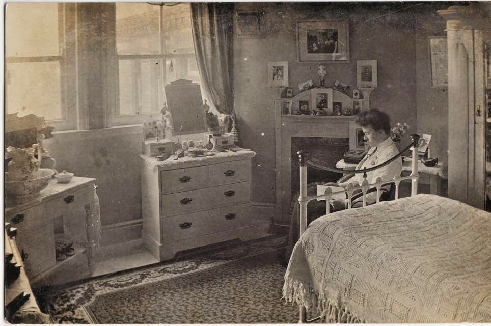 Edwardian bedroom with single white bed