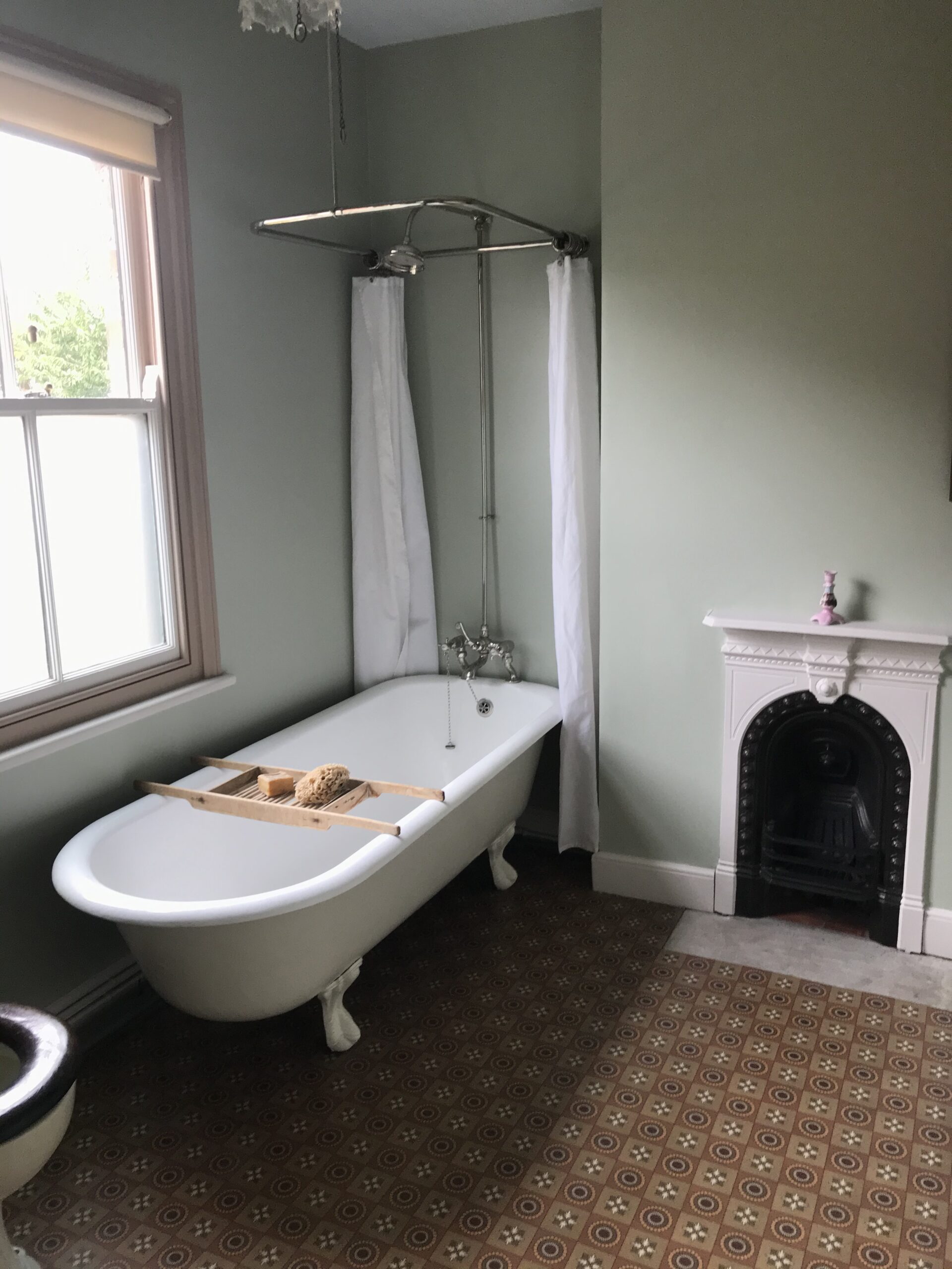 Edwardian bathroom with fireplace and Doulton bath