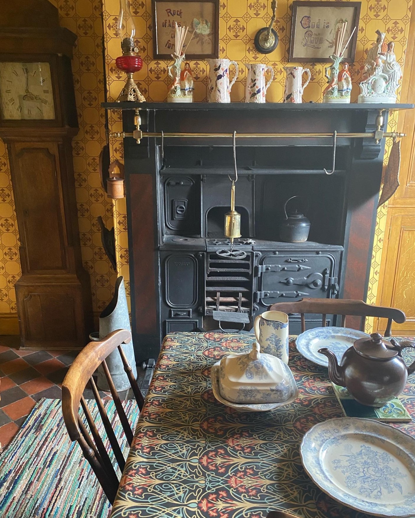 Victorian kitchen with 1895 sanitary wallpaper and cast iron range