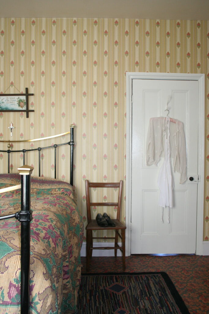 My master bedroom with recreated 1920s interior, including off white painted woodwork