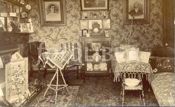 Victorian parlour showing a floral Victorian carpet rug and linoleum surround