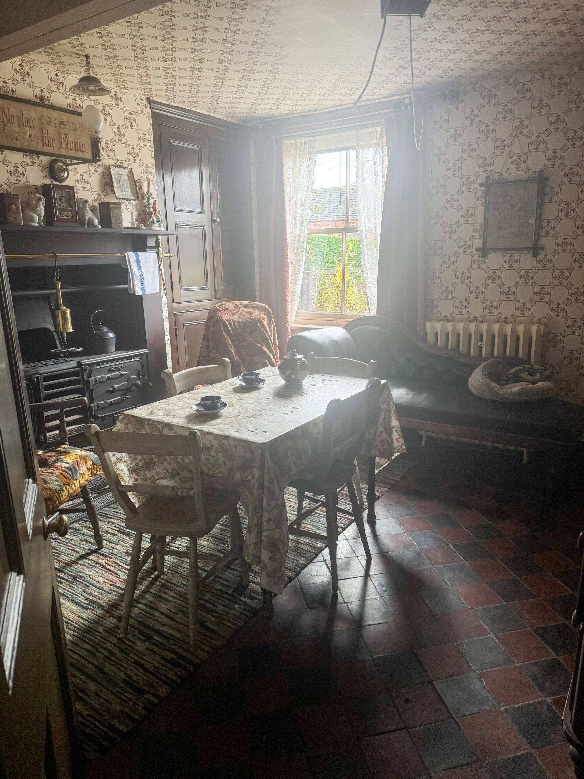 Victorian kitchen with 1895 sanitary wallpaper and cast iron range