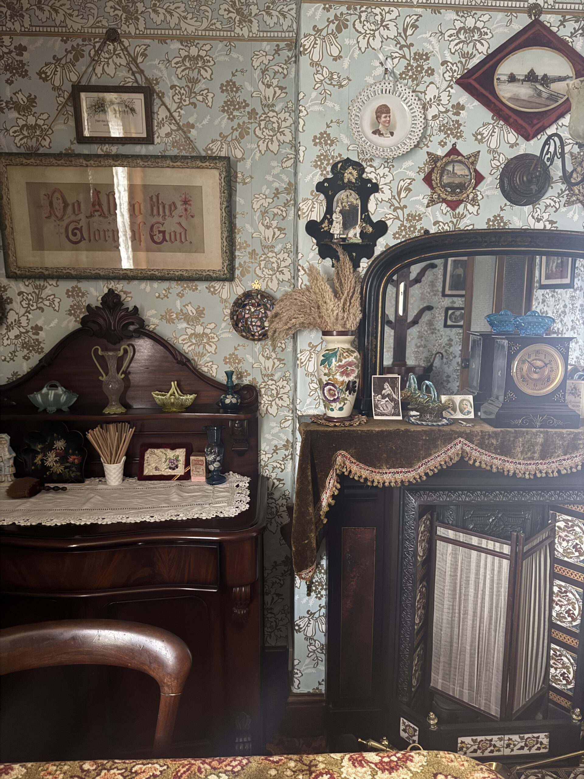 Victorian parlour with tiled fireplace and chiffonier